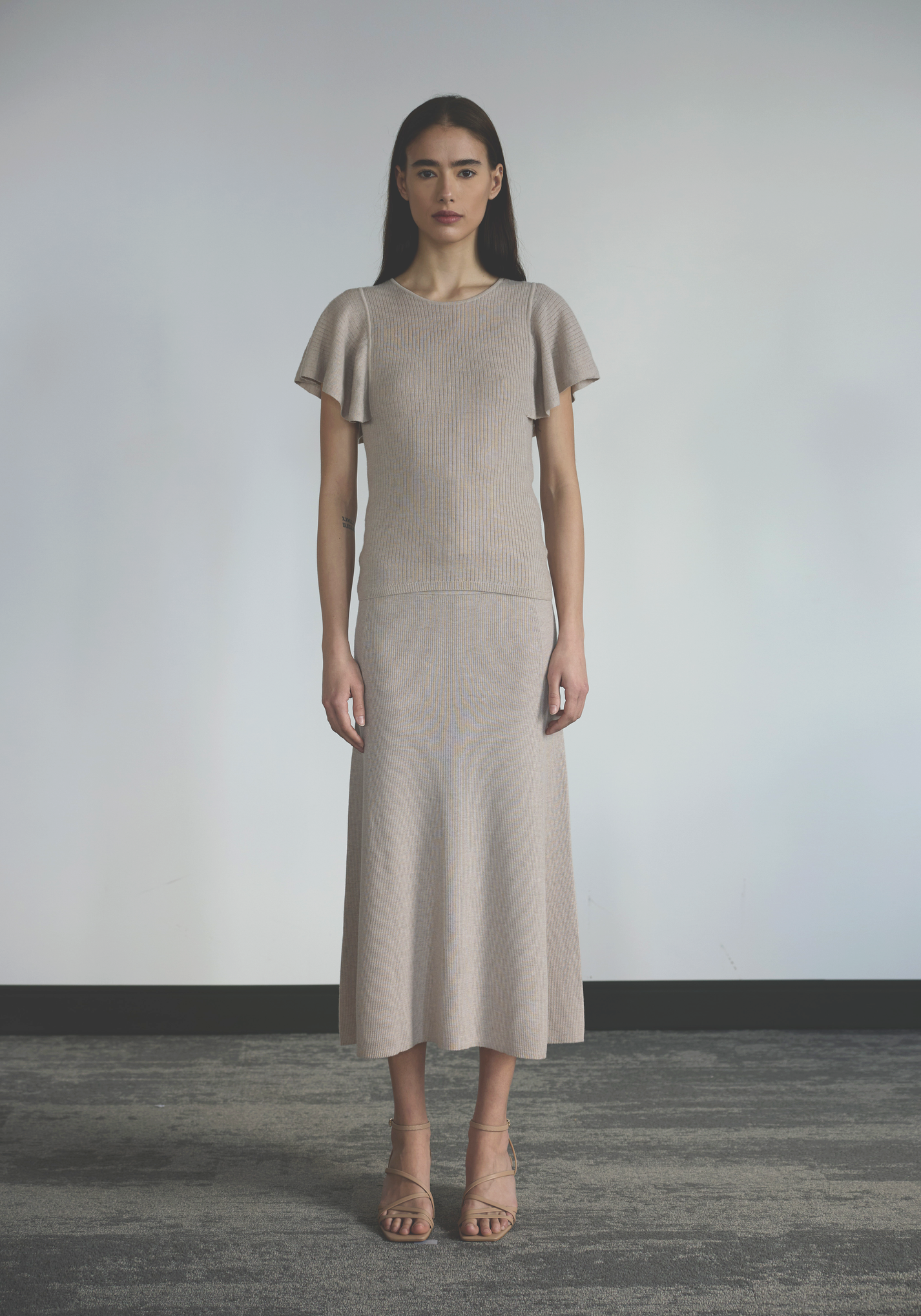 Women’s fine rib cashmere top with flutter sleeves and relaxed drape