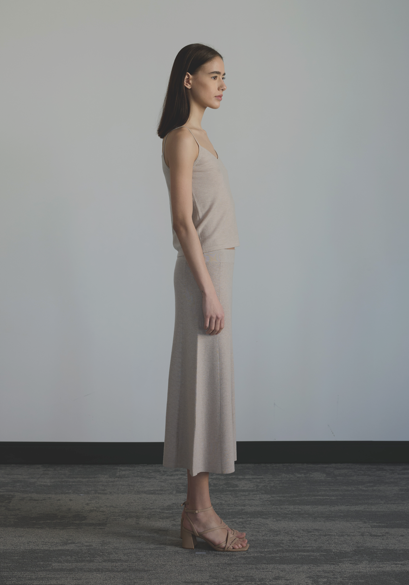 Side view of women’s close-fit cashmere tank top