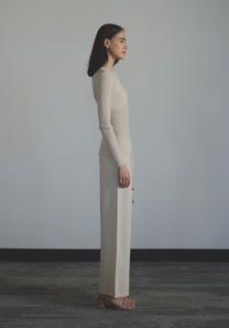 Side view of women’s slim fit cashmere sheer top