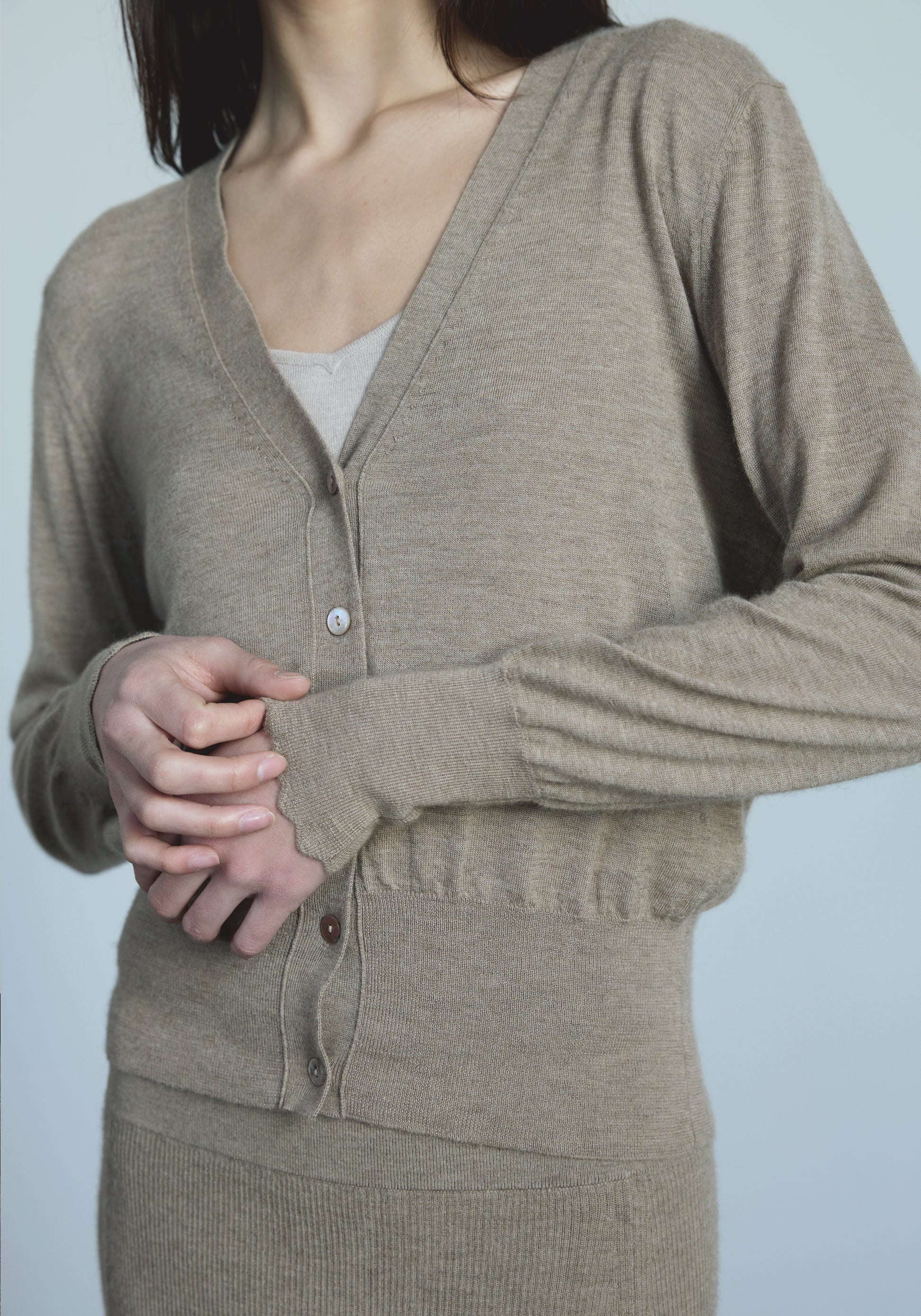 Ribbed cuff detail on women’s V-neck cashmere cardigan