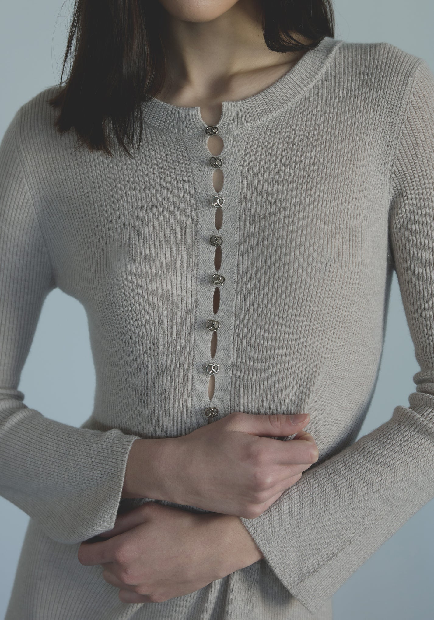 Fine vertical rib knit texture on elegant women’s ultra fine cashmere dress