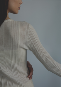 Fine rib knit texture with subtle sheerness on women’s cashmere top