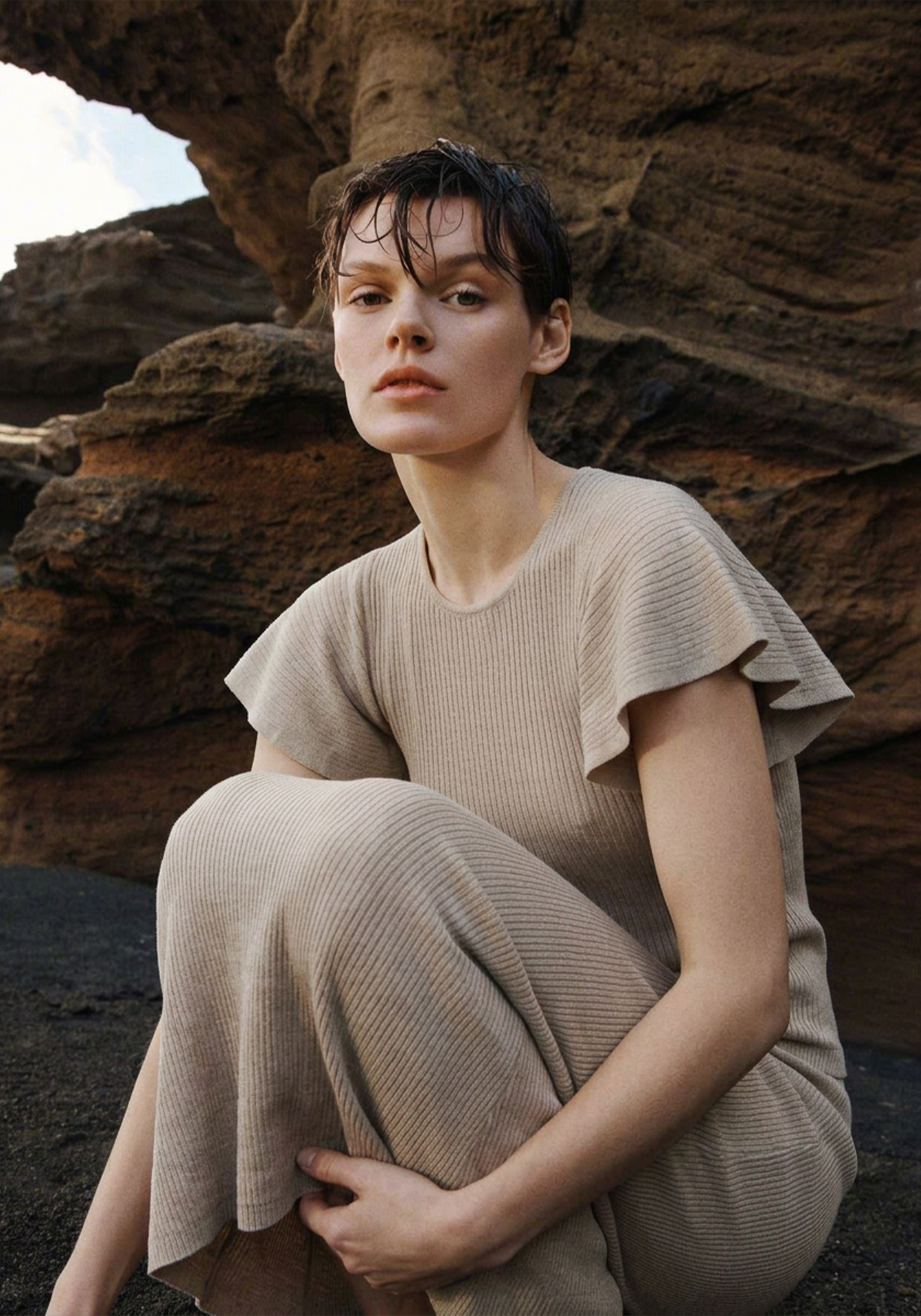 Women’s fine rib cashmere top styled with flutter sleeves and relaxed movement