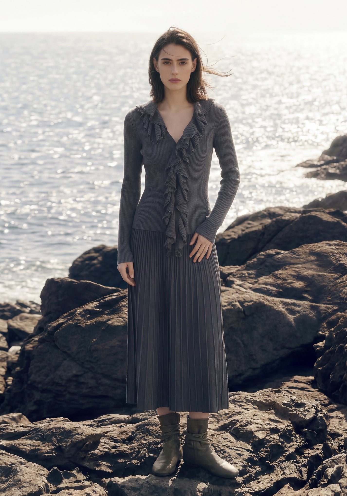 Women’s fine rib cashmere cardigan with cascading ruffle neckline and deep V-neck